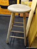 PRIMITIVE WOODEN BAR STOOL; TALL WOODEN BAR STOOL WITH ROUND SEAT AND BRACE CYLINDRICAL LEGS. THIS