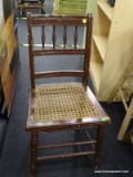 WOODEN SIDE CHAIR WITH RUSH BOTTOM; THIS WOODEN SIDE CHAIR HAS 4 SPINDLE BACK POSTS, INTACT RUSH