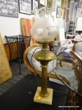 BRASS TABLE LAMP; FROSTED AND ETCHED GLASS GLOBE WITH RUFFLED TOP EDGE AND NARROW NECK, SITTING ON A