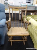 VINTAGE WOODEN ROCKING CHAIR; THIS HIGH BACK WOODEN ROCKING CHAIR HAS TURNED BACK POSTS, ROLLED ARMS