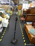 DARK BROWN/BLACK METAL FLOOR LAMP; WITH FINIAL AND HARP, TURNED POST, AND SQUARE BASE. MEASURES 65.5