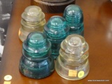 VINTAGE GLASS INSULATORS LOT; TOTAL OF 5 PIECES. INCLUDES AN ARMSTRONG DP-1, A TEAL H.C.CO., A