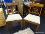 CARVED WOODEN SIDE CHAIRS WITH LIGHT GREEN UPHOLSTERED SEATS; TOTAL OF 2, BOTH WITH FLAT CREST