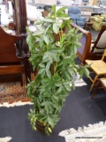 ARTIFICIAL FICUS TREE IN BUCKET BASE; HAS A CENTER STAKE AS TRELLIS AND VERY RICH LOOKING WOODEN