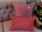 RUBY RED ACCENT PILLOWS; 2 TOTAL PIECES. RECTANGULAR RED SATIN ON ONE SIDE WITH RIBBED FABRIC ON