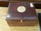 GENTLEMANS JEWELRY BOX; MAHOGANY LIFT TOP BOX WITH EMBLEM 