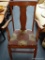 ANTIQUE ARM CHAIR; OAK UPHOLSTERED SEAT ARM CHAIR. HAS HORN THEMED UPHOLSTERY AND MEASURES 26 IN X