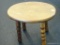 (WIN) OVAL WOODEN FOOTSTOOL WITH SPOOLED LEGS; MEASURES 12.5 IN X 9.5 IN X 9.5 IN TALL. HAS PRINTED