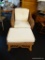 CHAIR AND OTTOMAN; WICKER ARM CHAIR WITH MATCHING WICKER OTTOMAN AND WHITE CUSHIONS. CHAIR MEASURES