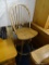 WOODEN BOW BACK BARSTOOL; TALL WOODEN BOW BACK BARSTOOL WITH SWIVEL SEAT AND METAL FOOT REST.