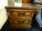 VINTAGE WOODEN NIGHTSTAND; 2 PANELED FRONT DRAWERS, MOLDED BORDERS, AND FLUSH TO FLOOR BASE. SOME