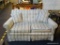 STRIPE UPHOLSTERED LOVESEAT; HAS A BUTTON TUFTED BACK AND 2 MATCHING ACCENT PILLOWS. GREAT FOR A