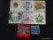 (BACK) SET OF DECORATIVE TILES; THIS LOT CONTAINS 8 DECORATIVE TILES. INCLUDED ARE TIMES SQUARE, THE