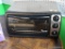 (BACK) TOASTMASTER TOASTER OVEN; BLACK AND CHROME TOASTMASTER TOASTER OVEN BROILER WITH TIMER,