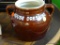 (BACK) HALL HOUSE DRESSING CROCK; BROWN DOUBLE HANDLED CROCK THAT SAYS 