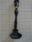 (BACK) CAST IRON LADLE; OVERSIZED CAST IRON SHELL PATTERN LADLE DECOR. MEASURES 26 IN TALL.