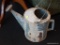 WATERING CAN; GALVANIZED TIN WATERING CAN WITH 1 CARRYING HANDLE AND A POURING HANDLE. HAS POURING