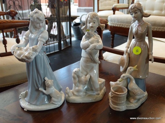 (WIN) PORCELAIN GLAZED FIGURINES; SET OF 3, MADE IN SPAIN. LADY HOLDING STRAW HAT WITH 2 GEESE AT