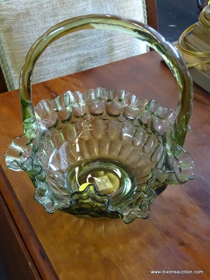 (WIN) VINTAGE GREEN GLASS BASKET; SINGLE HANDLE WITH RUFFLED EDGE AND THUMBPRINT PATTERN. MEASURES 8