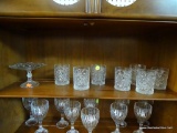 GLASS SHELF LOT; ITEMS FROM TOP SHELF INSIDE CABINET INCLUDING 7 HEAVY CUT GLASS ROCKS GLASSES