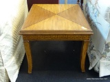 WOODEN END TABLE; X-PATTERNED INLAY ON TOP SURFACE WITH GREEK KEY BORDER UNDERNEATH AND 4 SABER