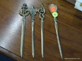 BRASS LETTER OPENERS; SET OF 4. HANDLES HAVE ACCENTS RELATED TO MEDICINE/PHARMACY, ANCHOR WITH ROPE,