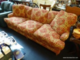 VINTAGE MICHAEL THOMAS FLORAL SOFA; DARK RED WITH TAN PATTERNED UPHOLSTERY, WITH 3 SEAT CUSHIONS,