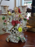 (WIN) VINTAGE UCAGCO PORCELAIN VICTORIAN CANDLESTICK; HOLDS 2 TAPER CANDLES, PAINTED IN PASTELS WITH