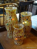 HURRICANE SHADES; LOT OF 3 MOSAIC HURRICANE SHADES IN TONES OF GOLD, BROWN, AND BURGUNDY. TALLEST