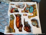 PORCELAIN NATIVITY SCENE; TOTAL OF 9 PIECES INCLUDING THE 3 KINGS, MARY, JOSEPH, THE SHEPHERD, A