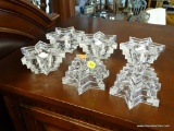 LEAD CRYSTAL CANDLESTICK HOLDERS; ALL ARE IN A STAR SHAPE AND ARE MADE BY WMF CO. IN GERMANY. ALL