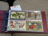 BINDER FULL OF POSTCARDS; INCLUDES A TOTAL OF APPROXIMATELY 120 VINTAGE HOLIDAY POSTCARDS. ALL ARE
