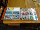 BINDER FULL OF POSTCARDS; INCLUDES APPROXIMATELY 290 POSTCARDS FROM AROUND THE WORLD. SOME ARE