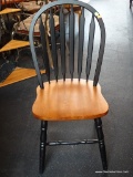 BOW BACK SIDE CHAIR; BLACK PAINTED AND WOODEN PLANK BOTTOM BOW BACK SIDE CHAIR. MEASURES 18 IN X 18