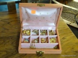 SMALL MAUVE JEWELRY BOX AND CONTENTS; BOX MEASURES 7 5/8 IN WIDE AND HAS CONTENTS SUCH AS PATRIOTIC