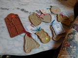 SET OF STONE COOKIE ART MOLDS; THIS LOT CONTAINS 8 STONE COOKIE MOLDS. 7 ARE MADE BY BROWN BAG