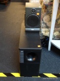 SURROUND SOUND SPEAKERS; SET OF 2 BLACK SURROUND SOUND SPEAKERS. ONE IS MADE BY BOSE AND THE OTHER