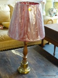 (BACK) TABLE LAMP; BRASS AND WOODEN TABLE LAMP WITH BURGUNDY SHADE AND BRASS FINIAL. MEASURES 32 IN