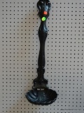 (BACK) CAST IRON LADLE; OVERSIZED CAST IRON SHELL PATTERN LADLE DECOR. MEASURES 26 IN TALL.