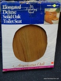 (BACK) ELONGATED AMERICAN OAK TOILET SEAT; STILL IN THE ORIGINAL BOX! ELONGATED DELUXE SOLID OAK