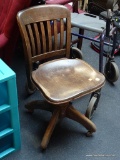 (BACK) VTG SIKES & CO WOODEN ROLLING OFFICE CHAIR; ROUNDED BACK WITH 6 VERTICAL SLATS ACROSS, MOLDED