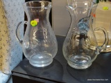 (BACK) SET OF ETCHED GLASS PITCHER; SET OF TWO CLEAR GLASS PITCHERS WITH ETCHED FLORAL DESIGN ON THE