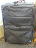 TRAVELPRO LUGGAGE CASE; 1 OF A PAIR OF BLACK IN COLOR AND HAS ROLLING CAPABILITIES WITH TELESCOPING