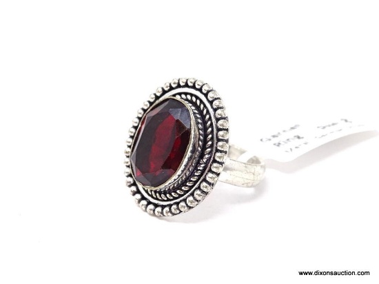 GERMAN SILVER & GARNET GEMSTONE RING. APPROX. RING SIZE 8.