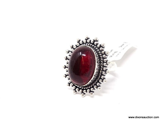 GERMAN SILVER & GARNET GEMSTONE RING. APPROX. RING SIZE 8.