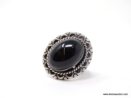 GERMAN SILVER & BLACK ONYX RING. APPROX. RING SIZE 7.