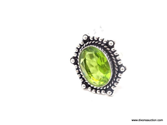 GERMAN SILVER & PERIDOT GEMSTONE RING. APPROX. RING SIZE 6.