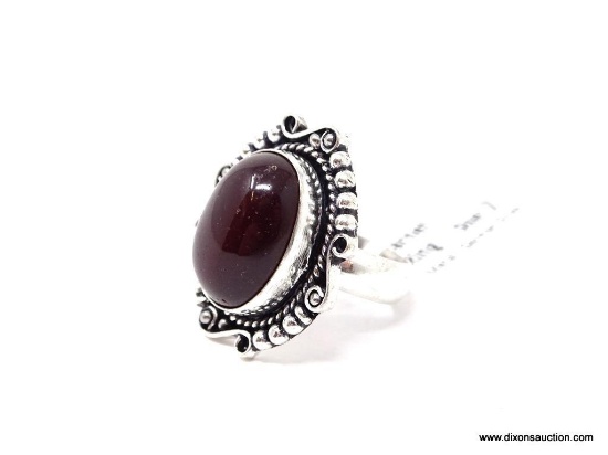 GERMAN SILVER & GARNET GEMSTONE RING. APPROX. RING SIZE 7.