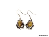 VINTAGE PAIR OF NATIVE AMERICAN SILVER TONE TIGER EYE FRENCH WIRE EARRINGS. STONES MEASURE APPROX.