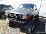 1985 PRIMER BLACK TOYOTA PICK UP TRUCK; VIN JT4RN66S0F5052518. TOYOTA SR5 XTRACAB 4WD PICK UP TRUCK.